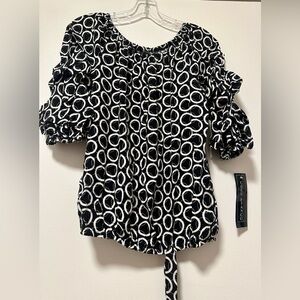 🌴🍂Coco Bianco Women’s Black & White Puff Sleeve Top – Chic Modern Elegance.🍂🌴